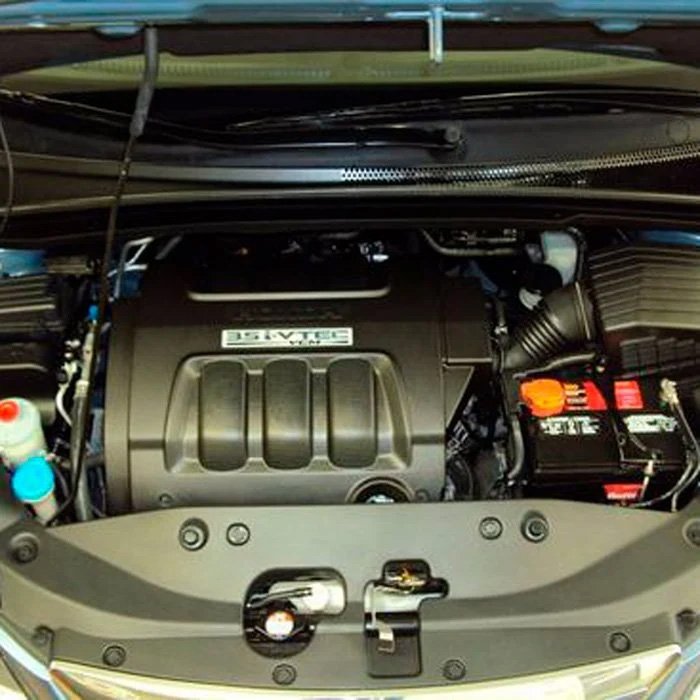 Clean and well-maintained engine bay after a detailing service.