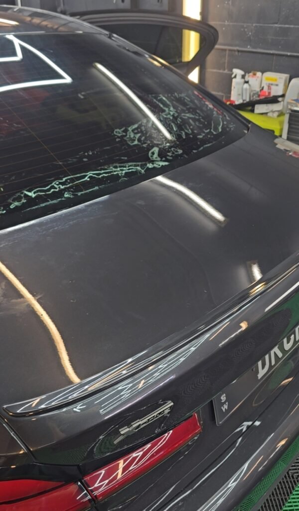 Close-up of ceramic window tint applied to a car window