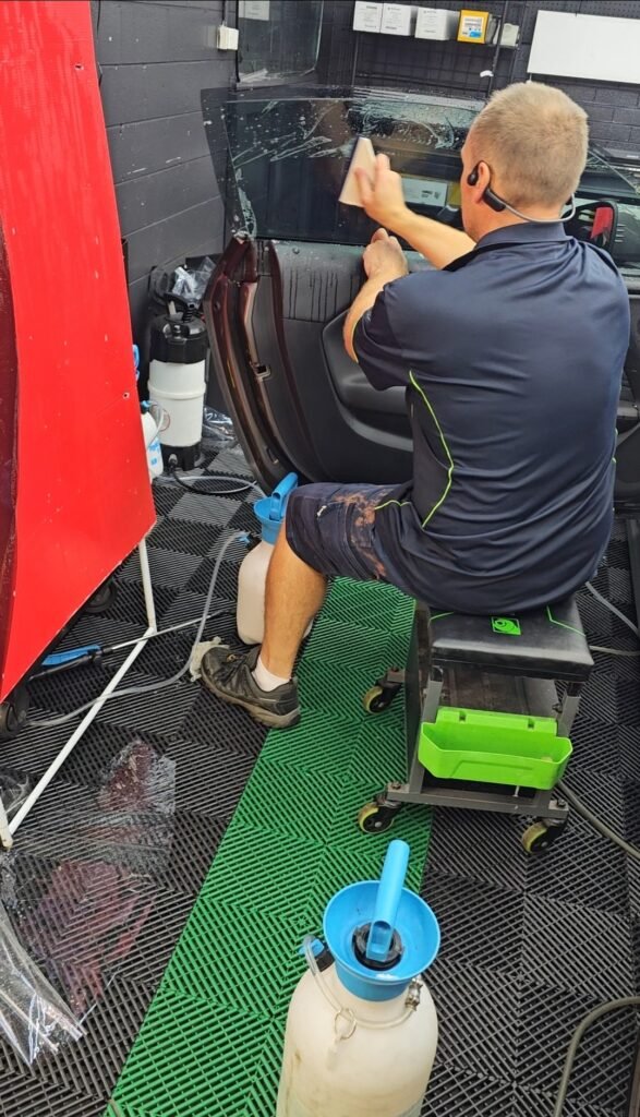 Car with full window tint across all side and rear windows